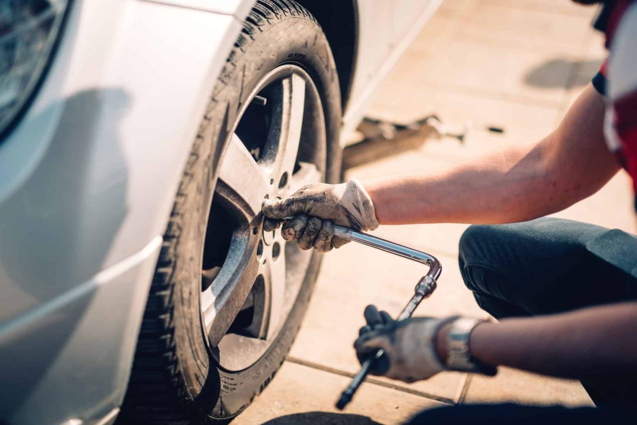 Remove The Hubcap Using A Lug Wrench